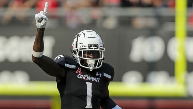 Sep 11, 2021; Cincinnati, Ohio, USA; Cincinnati Bearcats cornerback Ahmad Gardner (1) reacts after an interception against the Murray State Racers in the first half at Nippert Stadium. Mandatory Credit: Katie Stratman-USA TODAY Sports
